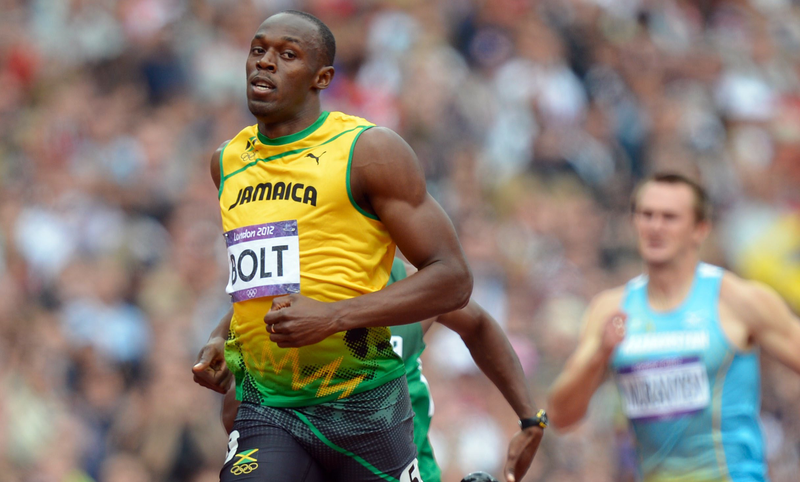 Illustration for article titled Photos Of Usain Bolt Looking Bored As He Blows Past The Best Runners In The World